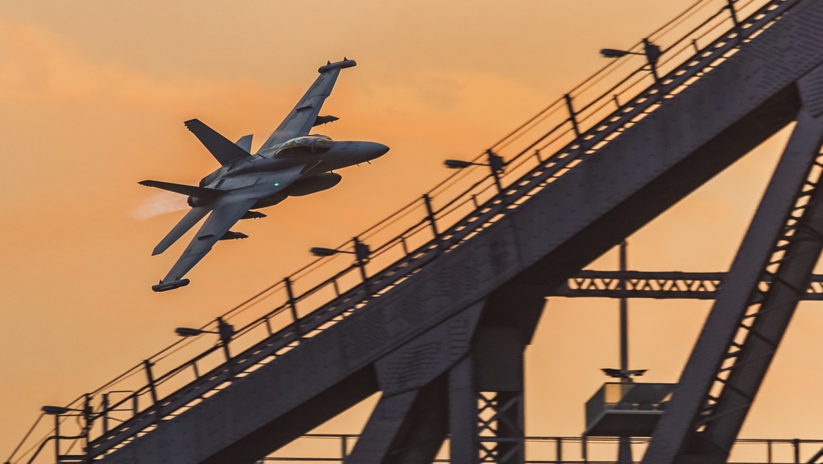 RAAF Boeing EA-18 Growler Reg. A46-302 is about to cross behind the Story Bridge while performing for Brisbane Riverfire Brisbane Australia, 29 September 2018.